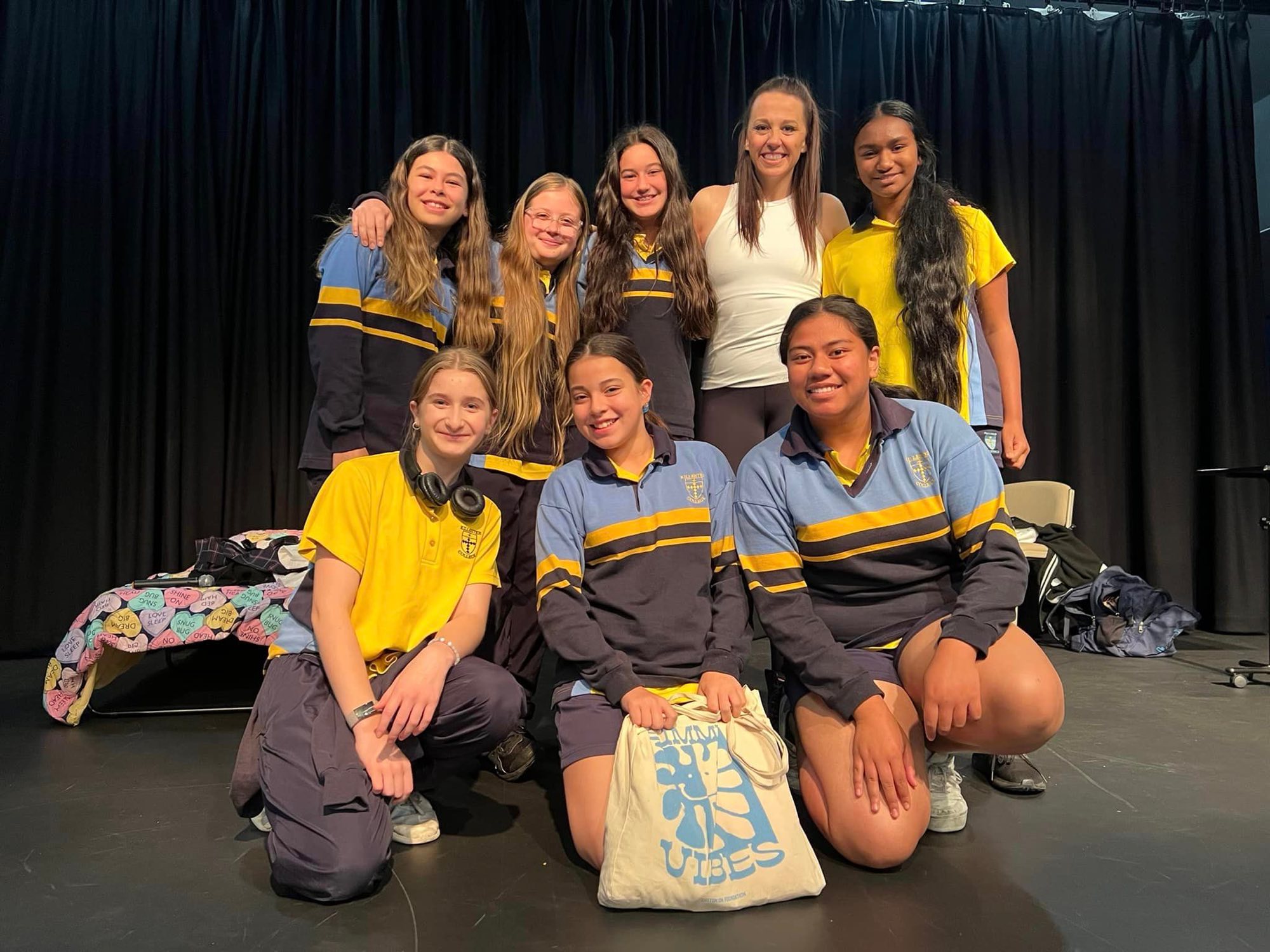 Students with Ally after a performance